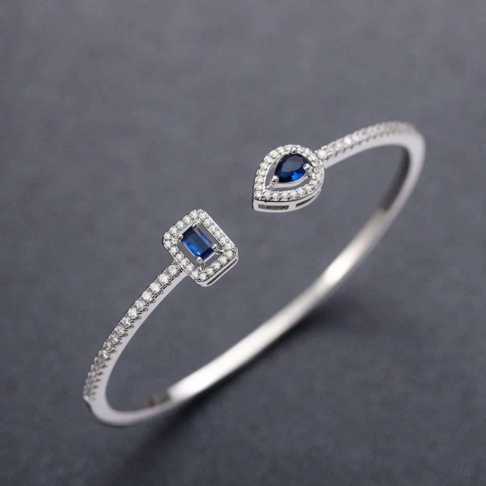 Platinum Diamond Bracelet With Blue Sapphire Emerald Cut Diamonds Minimalist Design For Women Everyday Wear
