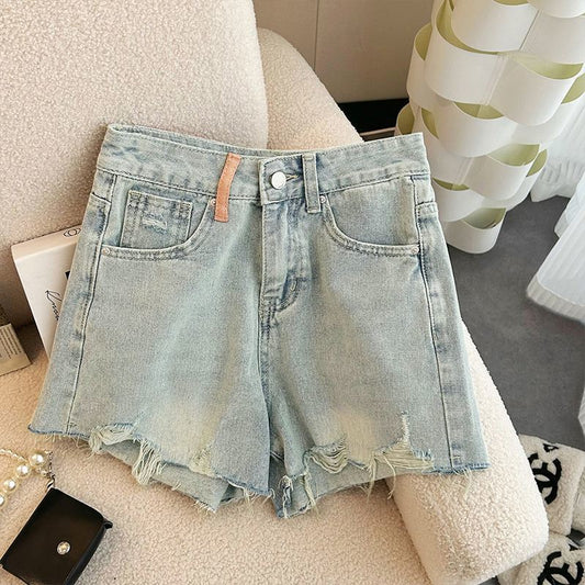 Summer 2023 New High Waist Slimming Design Sense Ripped Wide Leg Denim Shorts Women's Pants All-match Hot Pants by PDG ibma