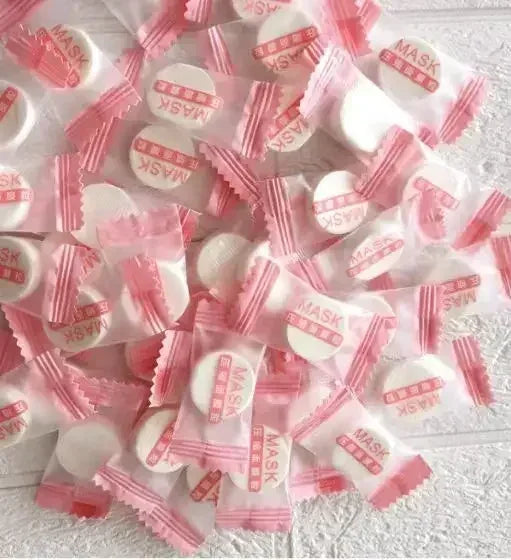 100pcs Disposable Compressed Facial Mask Portable Travel Non-woven Face Mask Skin Care Cotton Wrapped Masks Paper