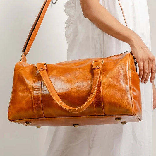 2025 New Custom High Quality Portable Light Weight Modern Style Waterproof Travel Crossbody Duffel Bag 100% Genuine Leather