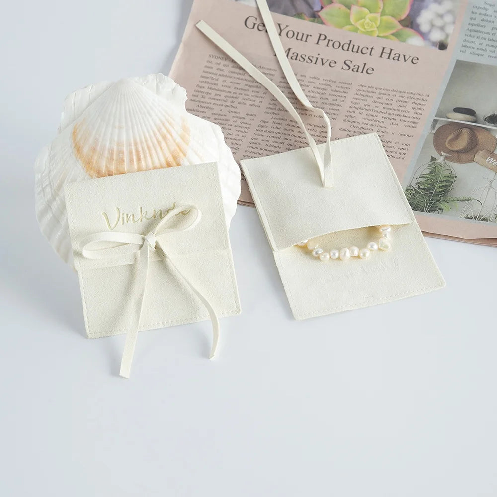 Wholesale 8*8cm Cream Luxury Microfiber Soft Packaging Bag Custom Unique Design with High Quality Logo for Jewelry Container