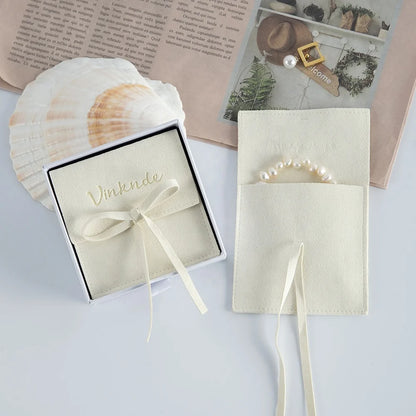 Wholesale 8*8cm Cream Luxury Microfiber Soft Packaging Bag Custom Unique Design with High Quality Logo for Jewelry Container