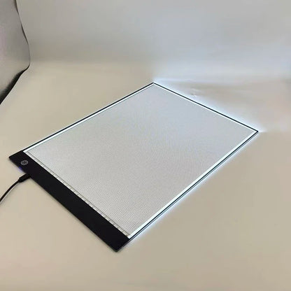 A3 Small Size Light Pad with Graduated Three-stage Adjustable Luminescent Backlight Illuminates the Drawing Board in the Dark.