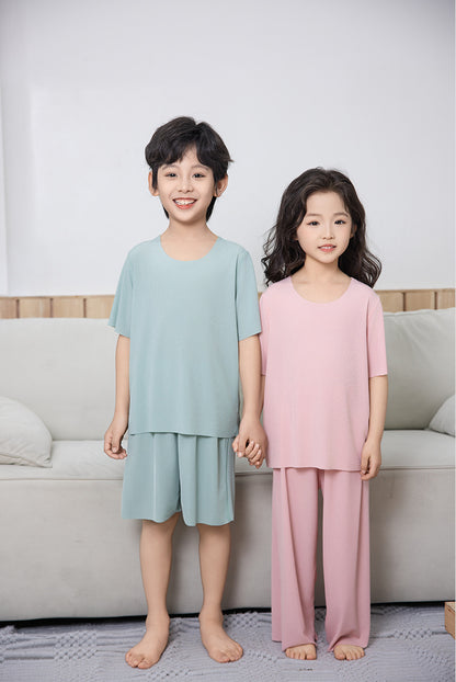 Summer New Style Boys' Short-Sleeved Loose Seamless Ice Silk Home Clothes Children's Two-Piece Set Girls' Pajamas Set Wholesale