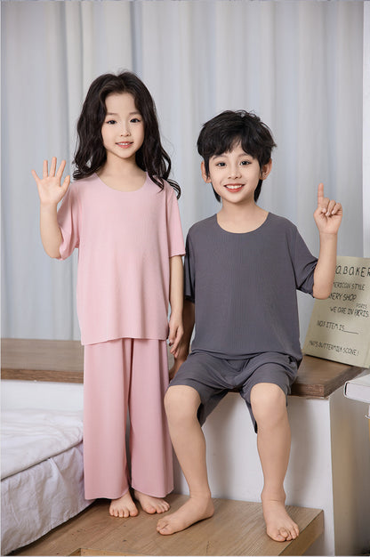 Summer New Style Boys' Short-Sleeved Loose Seamless Ice Silk Home Clothes Children's Two-Piece Set Girls' Pajamas Set Wholesale