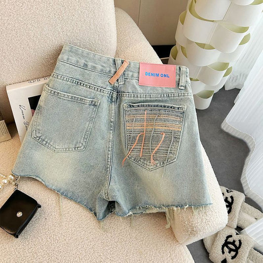 Summer 2023 New High Waist Slimming Design Sense Ripped Wide Leg Denim Shorts Women's Pants All-match Hot Pants by PDG ibma