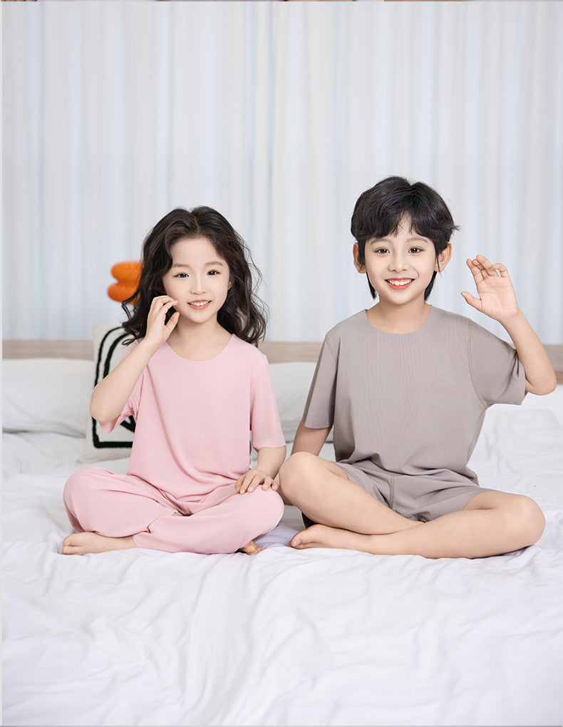 Summer New Style Boys' Short-Sleeved Loose Seamless Ice Silk Home Clothes Children's Two-Piece Set Girls' Pajamas Set Wholesale