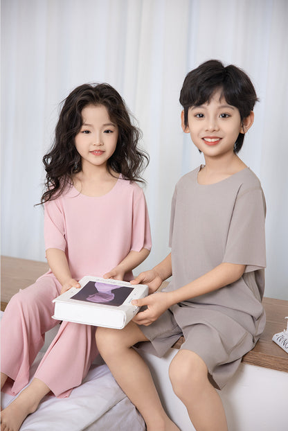 Summer New Style Boys' Short-Sleeved Loose Seamless Ice Silk Home Clothes Children's Two-Piece Set Girls' Pajamas Set Wholesale