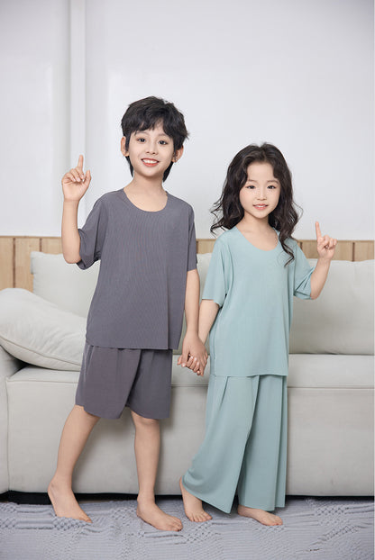 Summer New Style Boys' Short-Sleeved Loose Seamless Ice Silk Home Clothes Children's Two-Piece Set Girls' Pajamas Set Wholesale