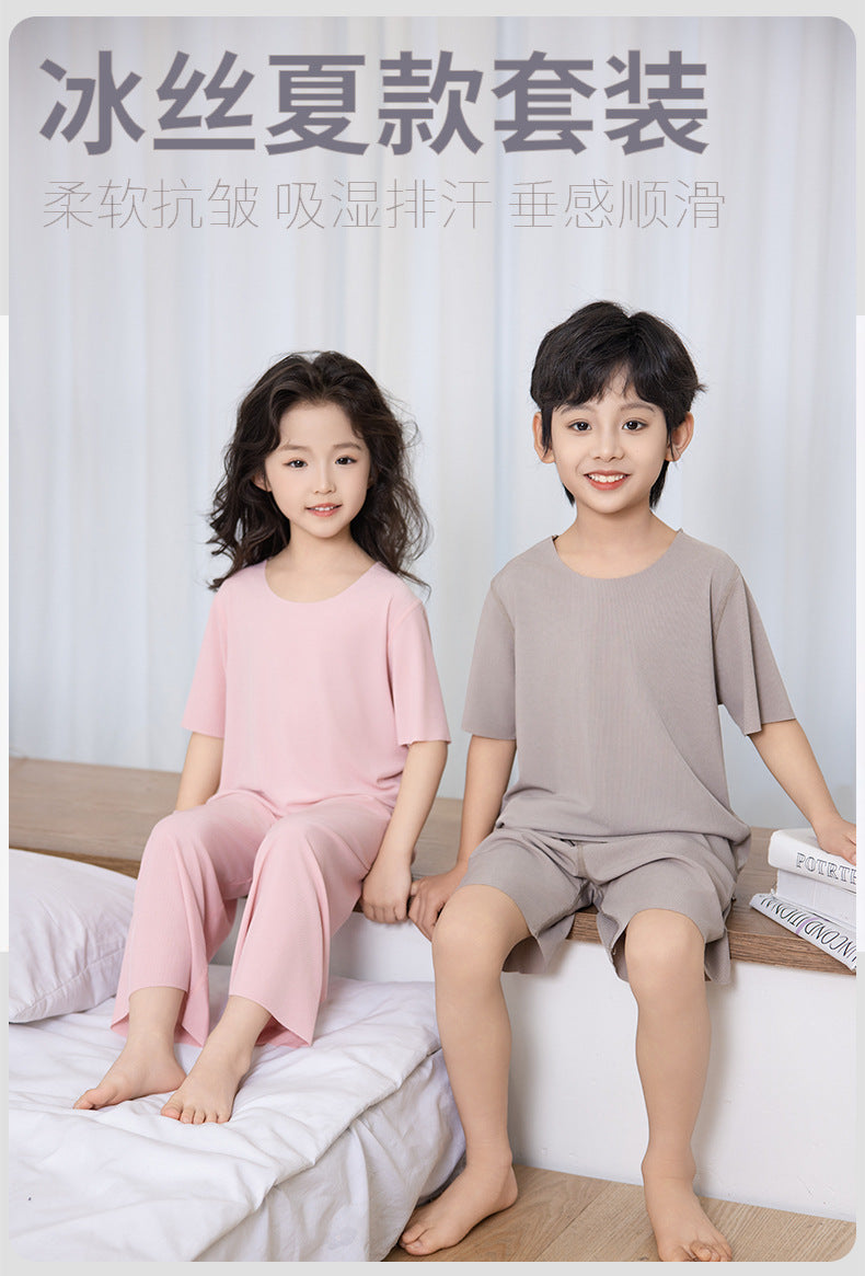 Summer New Style Boys' Short-Sleeved Loose Seamless Ice Silk Home Clothes Children's Two-Piece Set Girls' Pajamas Set Wholesale
