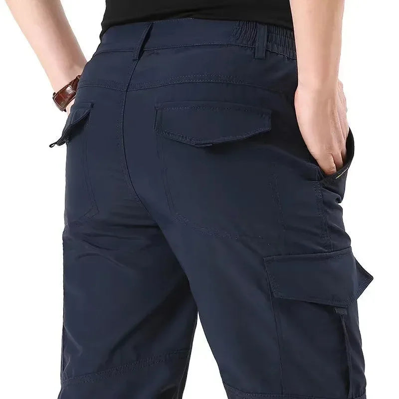 2025 New Outdoors Mens Tactical Pants Multiple Pocket Elasticity Urban Commuter Tacitcal Trousers Men Slim Fat Cargo Pant 5XL ﻿