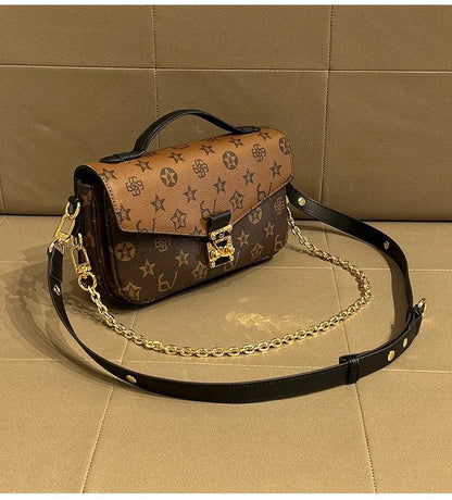 Light luxury brand women's handbag 2024 new autumn and winter high-end fashion designer mailman bag shoulder crossbody bag