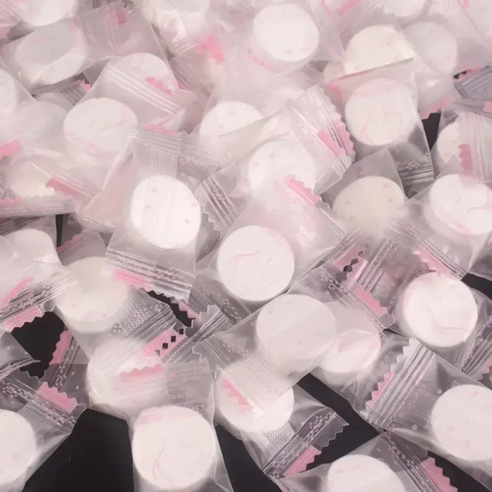 100pcs Disposable Compressed Facial Mask Portable Travel Non-woven Face Mask Skin Care Cotton Wrapped Masks Paper