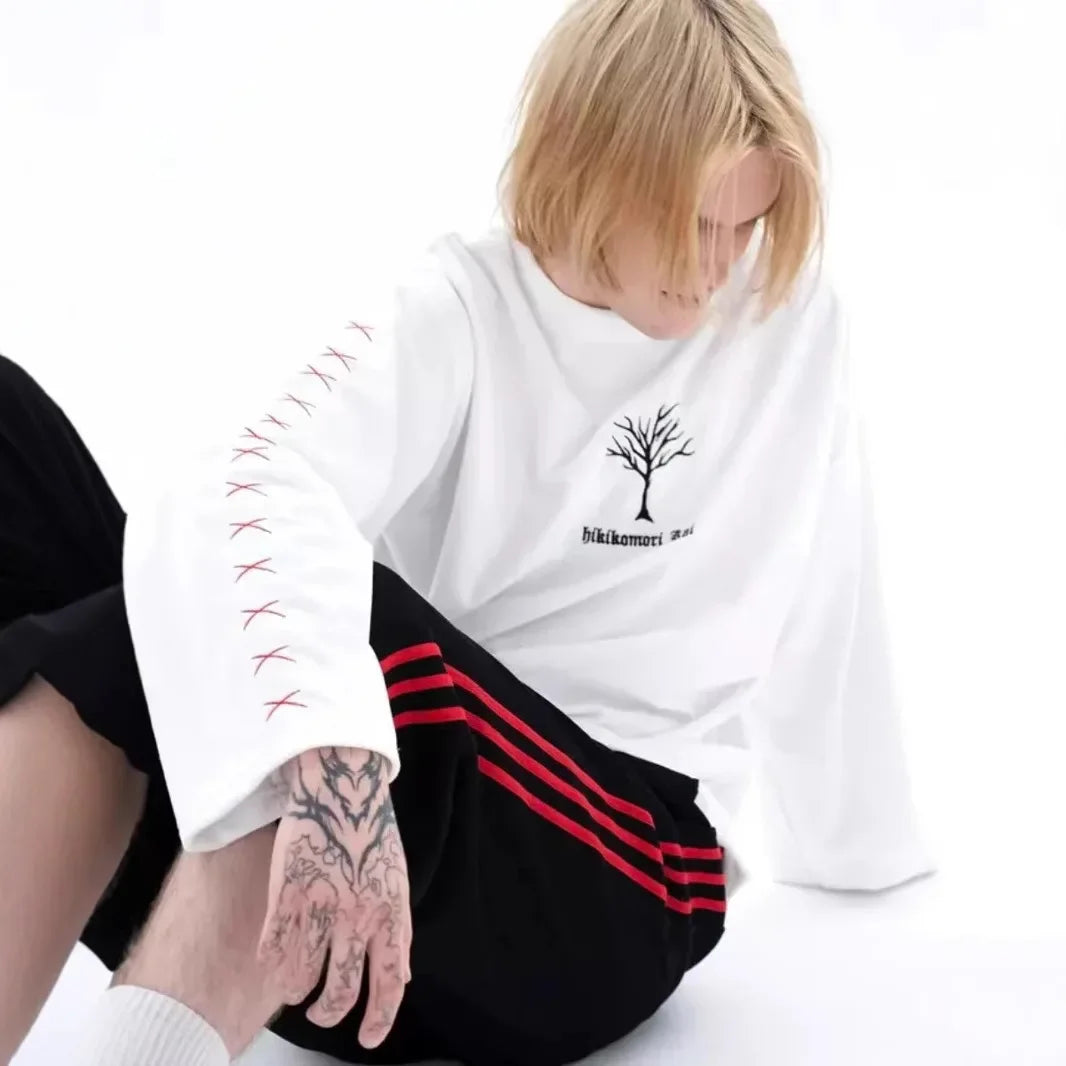 T-shirt à manches longues en pur coton, style streetwear décontracté et tendance, idéal pour le printemps et l'automne. Col rond.