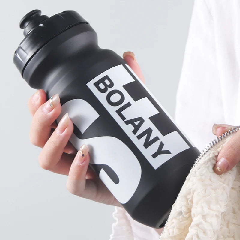 BOLANY 610ML Cycling Bike Water Bottle Bicycle Portable Kettle with Cover Matte Plastic Sports Bottle Outdoor Supplies