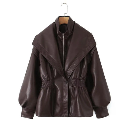 Veste en cuir marron à taille élastique pour femme, style décontracté, col à revers et fermeture éclair, collection automne-hiver.