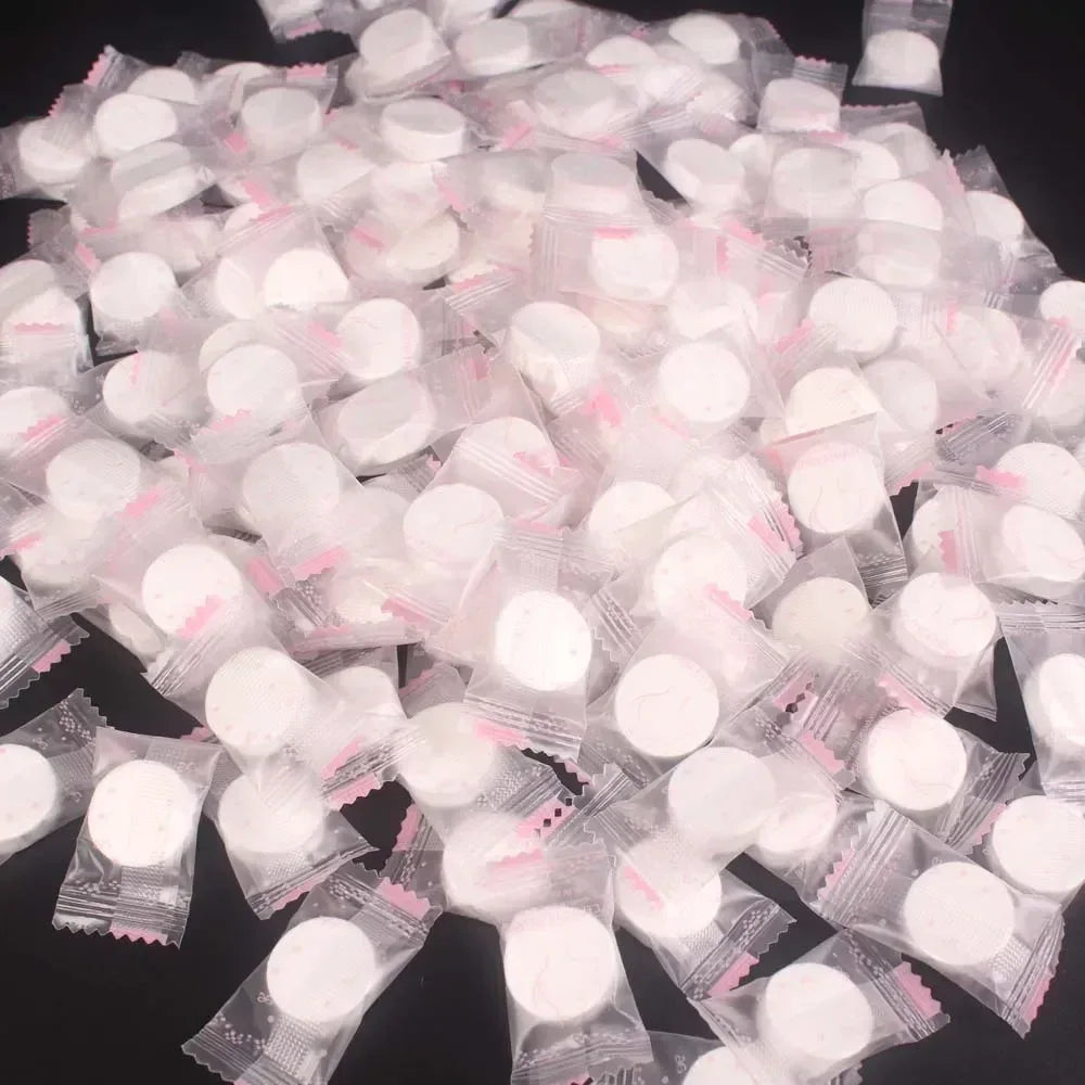 100pcs Disposable Compressed Facial Mask Portable Travel Non-woven Face Mask Skin Care Cotton Wrapped Masks Paper