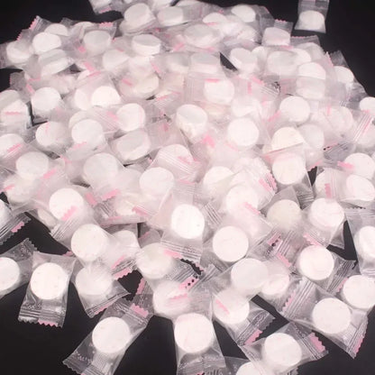 100pcs Disposable Compressed Facial Mask Portable Travel Non-woven Face Mask Skin Care Cotton Wrapped Masks Paper
