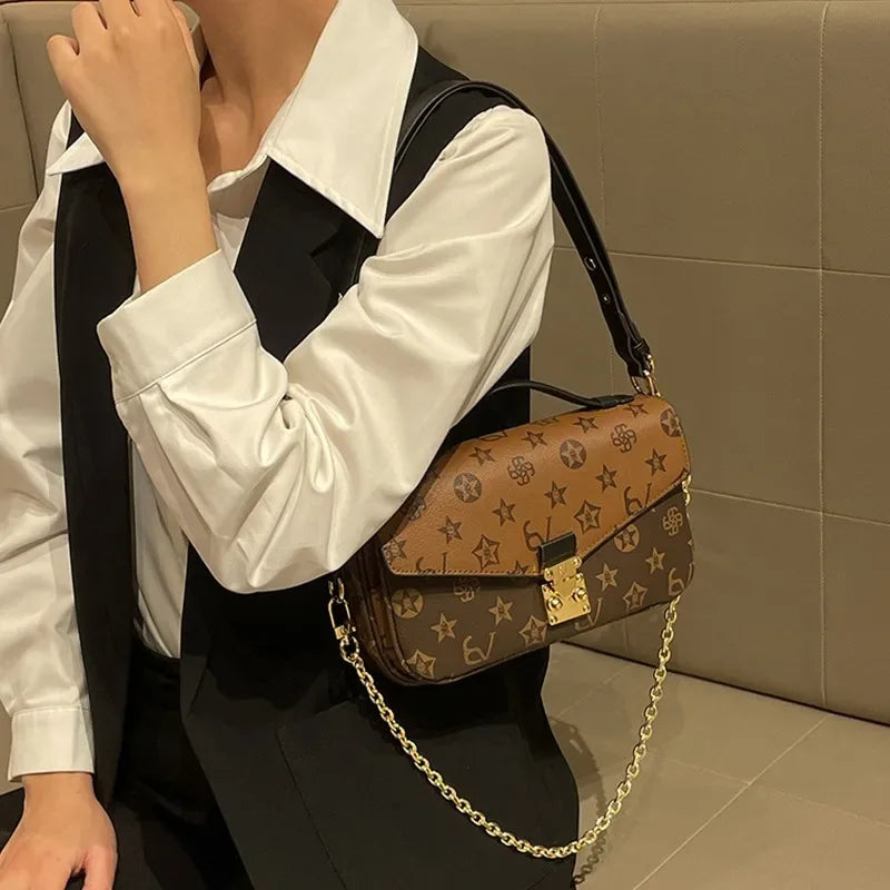 Light luxury brand women's handbag 2024 new autumn and winter high-end fashion designer mailman bag shoulder crossbody bag