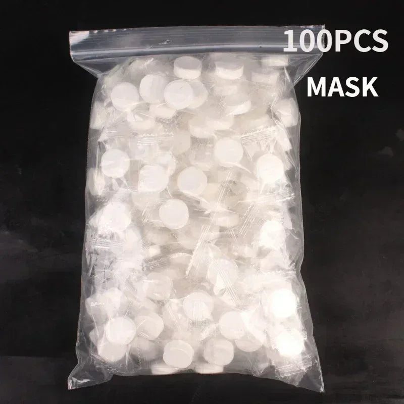 100pcs Disposable Compressed Facial Mask Portable Travel Non-woven Face Mask Skin Care Cotton Wrapped Masks Paper
