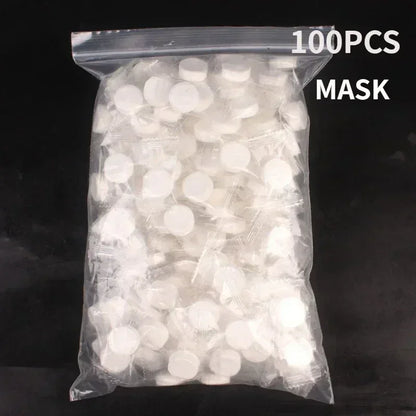 100pcs Disposable Compressed Facial Mask Portable Travel Non-woven Face Mask Skin Care Cotton Wrapped Masks Paper