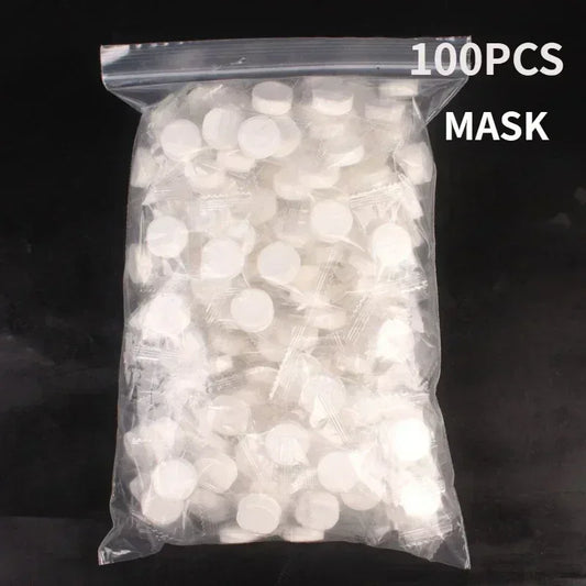 100pcs Disposable Compressed Facial Mask Portable Travel Non-woven Face Mask Skin Care Cotton Wrapped Masks Paper