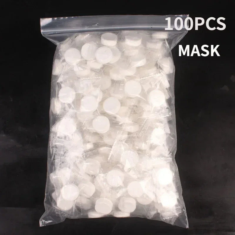 100pcs Disposable Compressed Facial Mask Portable Travel Non-woven Face Mask Skin Care Cotton Wrapped Masks Paper