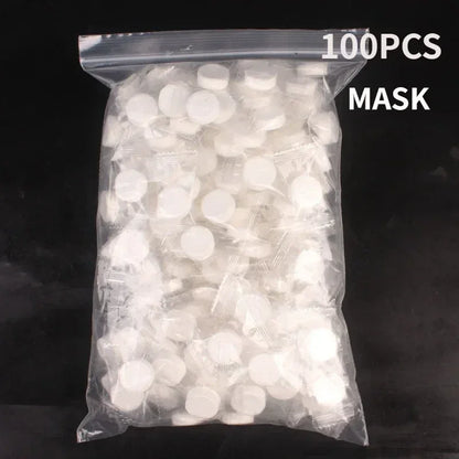 100pcs Disposable Compressed Facial Mask Portable Travel Non-woven Face Mask Skin Care Cotton Wrapped Masks Paper