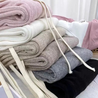 Pantalon d'automne-hiver en peluche pour femme, coupe droite et évasée, taille haute élastique, style décontracté et tendance, en laine tricotée.